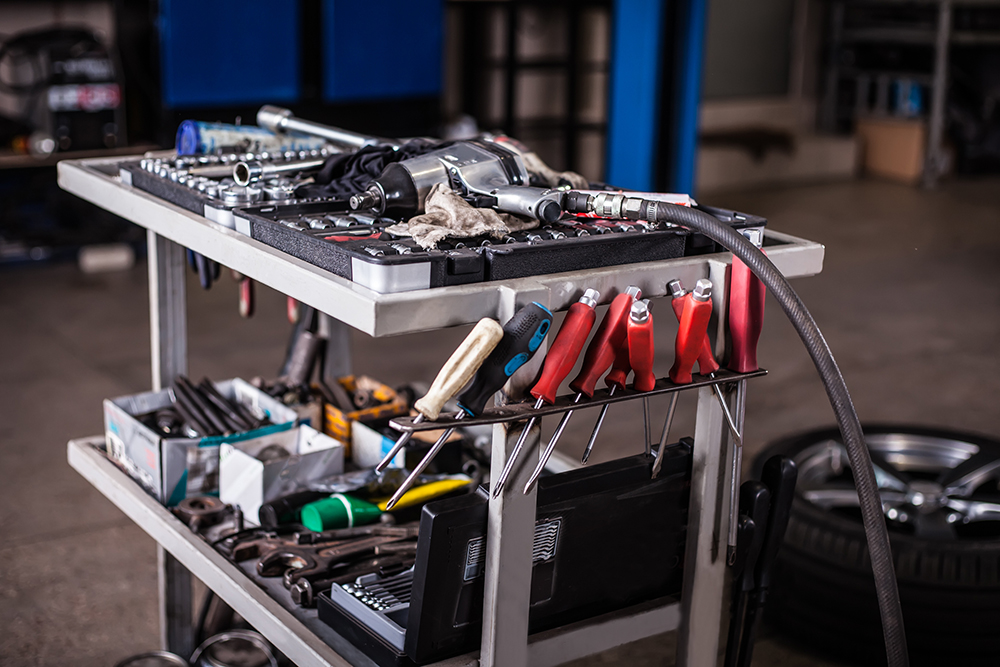 Assortment kit of tools in mechanic garage car service